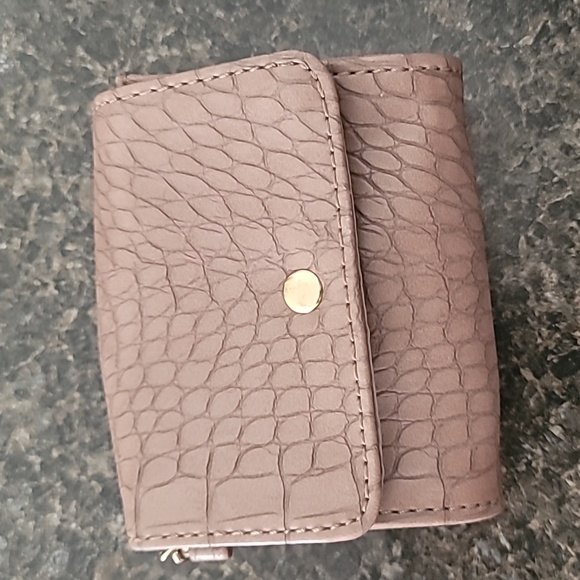 Handbags - Mini wristlet with a chain.